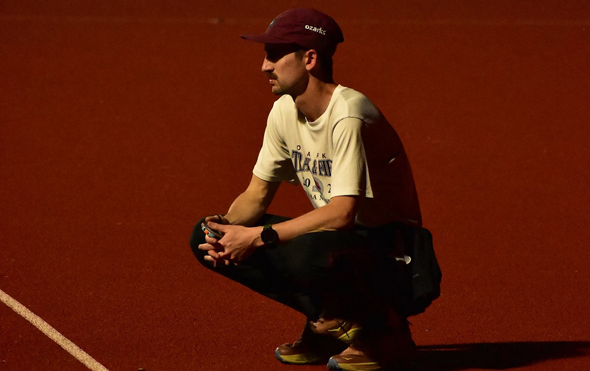 Student running on the College of the Ozarks Track